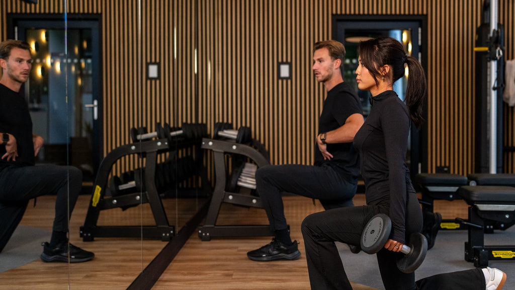 Personal trainer David showing exercises to his client while in a personal training session